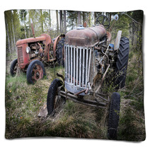 Two Old Rusty Tractor In The Forest Blankets 67663269