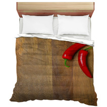 Two Red Hot Chili Peppers On A Wooden Background Bedding 66710225