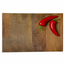 Two Red Hot Chili Peppers On A Wooden Background Rugs 66710225