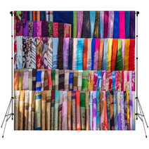 Various Of Colorful Fabrics And Shawls At A Market Stall Backdrops 67007817