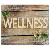 Wellness Written With Wooden Letters, Chamomile Flowers On Wood Rugs 72887337