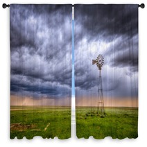 Windmill On A Farm In An Open Field Under A Dramatic Sky Window Curtains 205765028