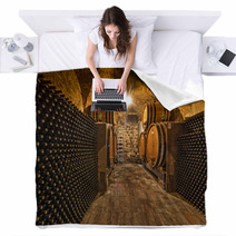 Wine Cellar With Bottles And Oak Barrels Blankets 57865730