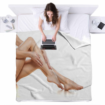 Woman Apply Cream On Her Bare Feet Blankets 60418733