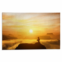 Woman Meditating In Yoga Position On The Top Of Mountains Rugs 68793630