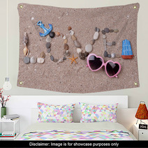 Word Love Made From Sea Shells And Stones On Sand Wall Art 67140398