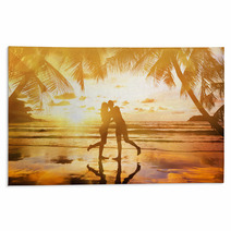 Young Couple Enjoying The Sunset Rugs 64185774