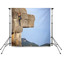 Young Female Free Climber On A Cliff Backdrops 64083981