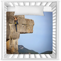 Young Female Free Climber On A Cliff Nursery Decor 64083981