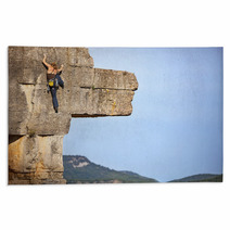 Young Female Free Climber On A Cliff Rugs 64083981