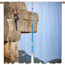 Young Female Free Climber On A Cliff Window Curtains 64083981