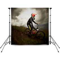 Young Man Riding A Mountain Bike Downhill Style Backdrops 41022198