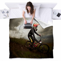 Young Man Riding A Mountain Bike Downhill Style Blankets 41022198