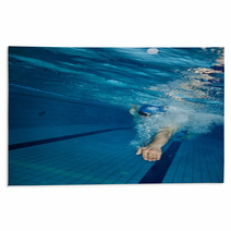 Young Man Swimming In Pool Rugs 102063205