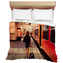 Young Woman About To Board A Train Bedding 64999128