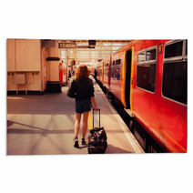 Young Woman About To Board A Train Rugs 64999128