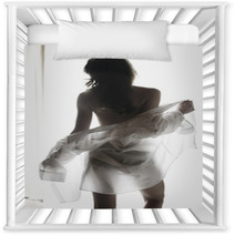 Young Woman Undressing Nursery Decor 56946346