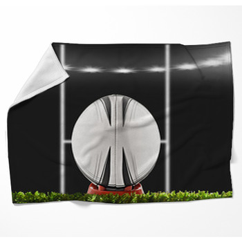 A Soccer Ball On A Soccer Field Woven Throw Blanket