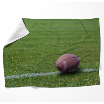 American Rugby Ball On The Grass Woven Throw Blanket