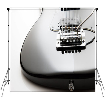 Black Electric Guitar Close Up On Custom Size Backdrop