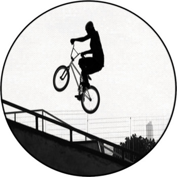 BMX - Girl Jumping With Bike Round Rug