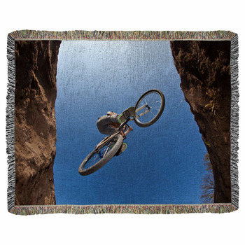 Boy Going Airborne With A Dirt  Bike Woven Throw Blanket