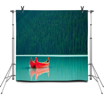 Canoes Floating Peacufully On Lake Fleece Backdrop