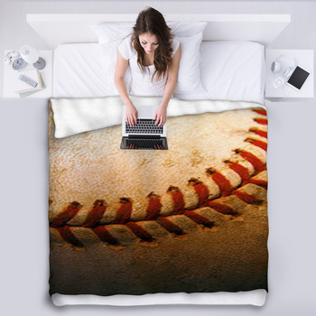 Closeup Of An Old, Used Baseball Fleece Bed Blanket