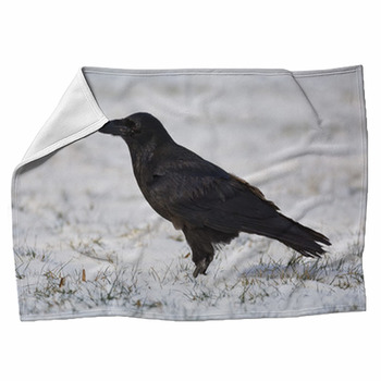 Common Raven On Snowy Grass Fleece Blanket