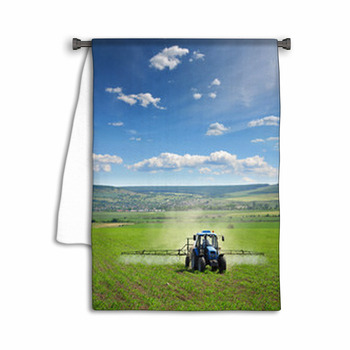 Farming Tractor Plowing And Spraying On Field Towel
