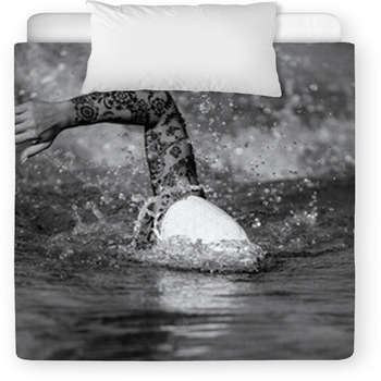 Female Front Crawl Swimmer With Toddler Comforter