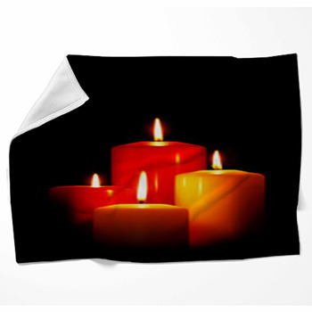 Four Christmas Candles On Black Fleece Blanket