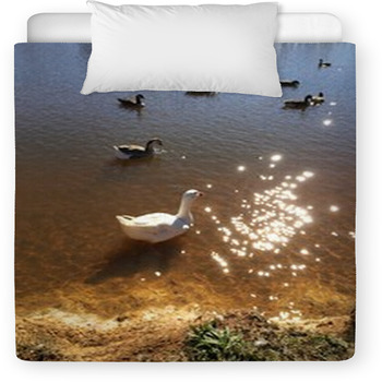 Geese Swimming In A Sparkling Golden Pond Toddler Duvet