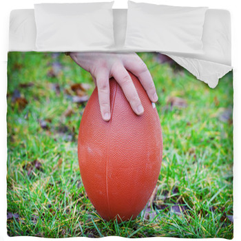 Hand On Rugby Ball On Green Grass Fleece Bed Blanket