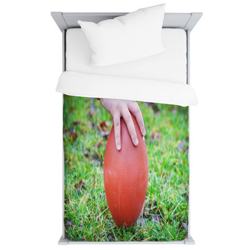 Hand On Rugby Ball On Green Grass Toddler Duvet