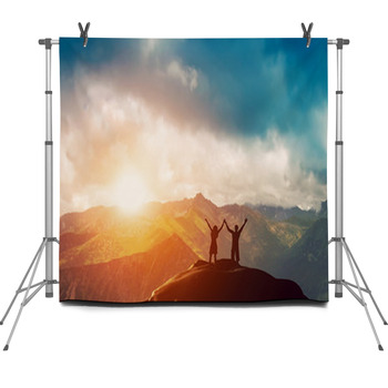 Happy Couple Together On The Peak Of A Fleece Backdrop