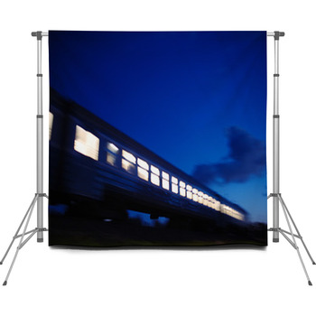 Illuminated Train Traveling Past Custom Size Backdrop