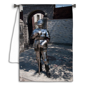 Knight In The Ancient Metal Armor Standing Near Towel