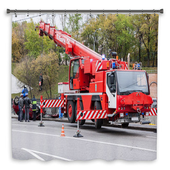 Large Red Rescue Vehicle Helps Injured In  Shower Curtain