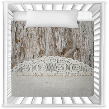 Linen Fabric With Lace On The Old Baby Crib Comforter