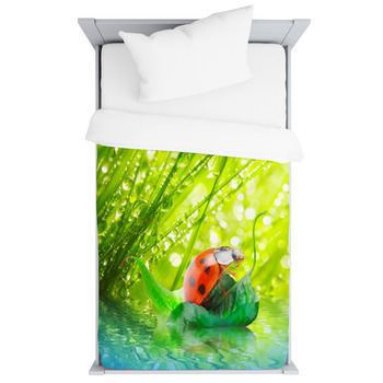 Little Ladybug Floating On The Leaf. Toddler Duvet