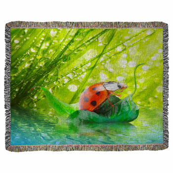 Little Ladybug Floating On The Leaf. Woven Throw Blanket