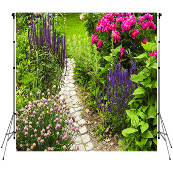 Lush Blooming Summer Garden With Paved Fleece Backdrop