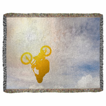 Man Doing An Jump With A Bmx Bike Woven Throw Blanket