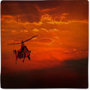 Military Helicopter In Flight Against A Baby Blanket