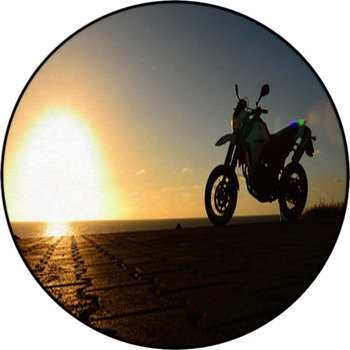 Motorcycle In The Sunset Round Rug