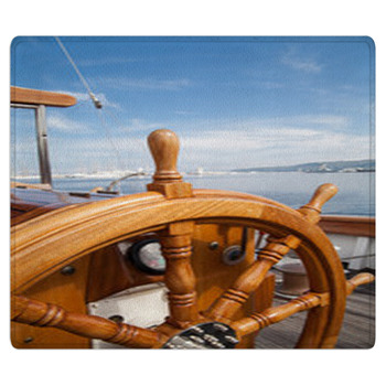 Old Boat Steering Wheel From Wood Area Rug