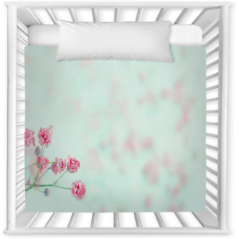 Pink Baby's Breath Flowers With Baby Crib Comforter