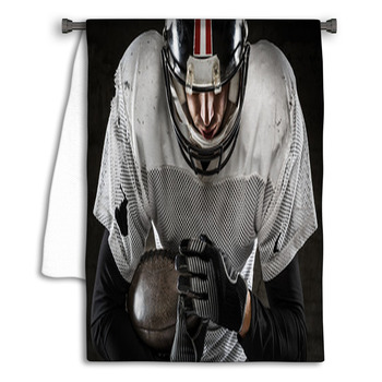 Portrait Of American Football Player Holding A Towel