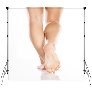 Pretty Female Legs And Bare Feet On Fleece Backdrop